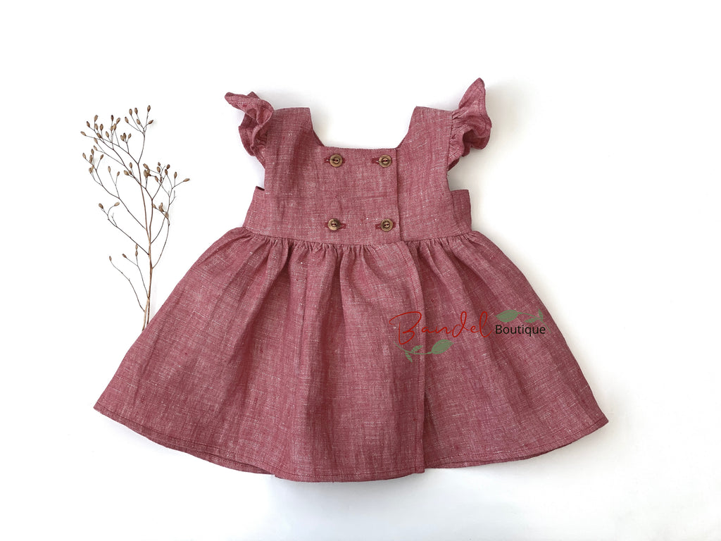 Pink red dress with ruffled straps on a white background